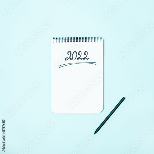 Obraz na płótnie Top view of empty notebook ready for New 2022 Year resolutions or wish list w salonie