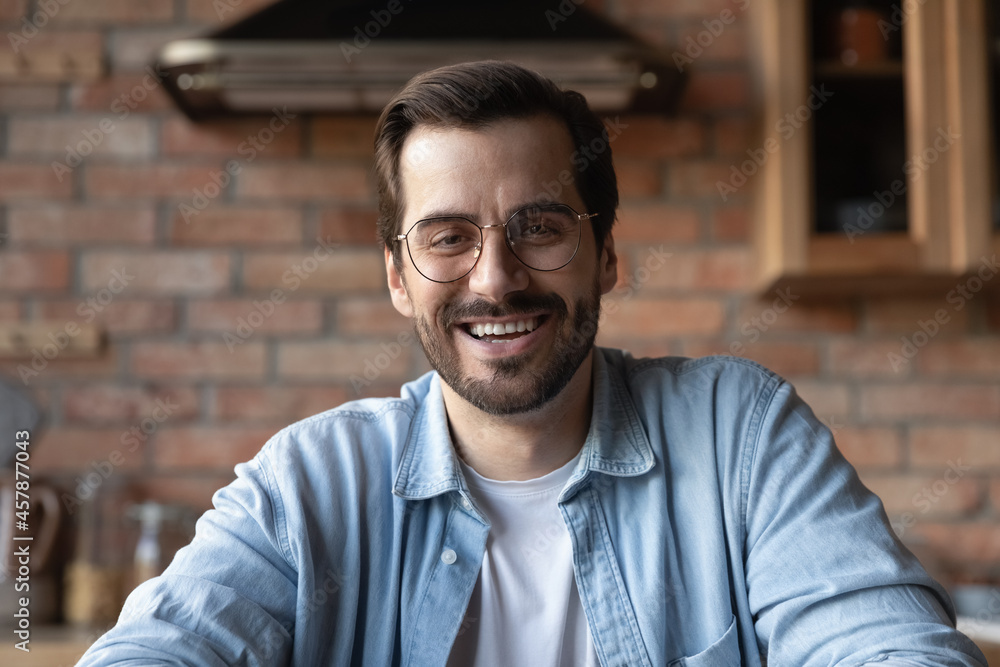 Head shot portrait smiling bearded man in glasses talking speaking at camera, making video call, chatting with colleagues or business partners, businessman freelancer engaged in internet conference Head shot portrait smiling bearded man in glasses talking speaking at camera, making video call, chatting with colleagues or business partners, businessman freelancer engaged in internet conference