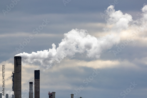 Chimneys emitting white water vapor in a chemical plant. Shot in Sweden, Scandinavia