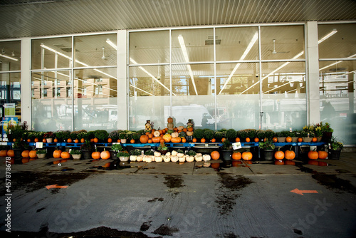 Pumpkins outside a grocery store