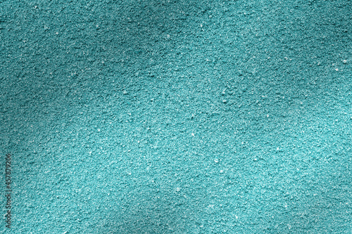 colored asphalt with blue colors. Texture or background in blue tone.