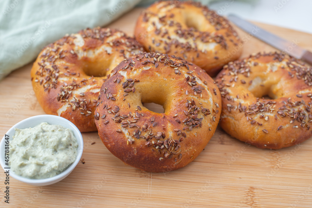 freshly baked whole grain bagels. heap of fresh baked bagels freshly baked whole grain bagels. heap of fresh baked bagels