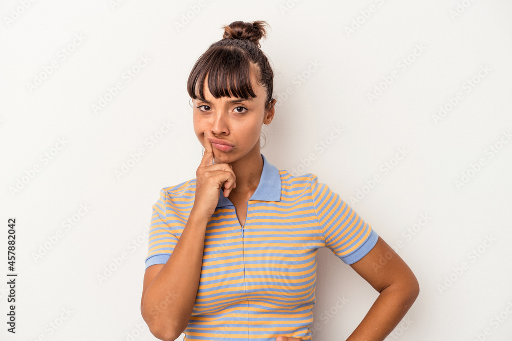 Young mixed race woman isolated on white background unhappy looking in camera with sarcastic expression. Young mixed race woman isolated on white background unhappy looking in camera with sarcastic expression.