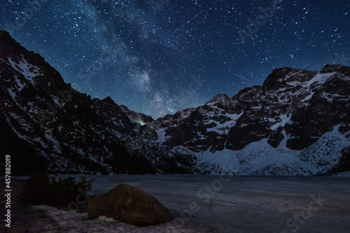 Fototapeta Naklejka Na Ścianę i Meble -  Bright starry sky with the milky way on the background of High Tatras mountains