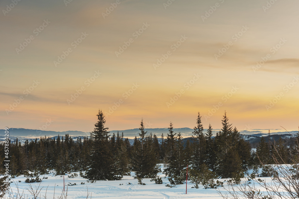 Beautiful winter views of the High Tatra Mountains with tourists, skiers and amazing states of nature Beautiful winter views of the High Tatra Mountains with tourists, skiers and amazing states of nature
