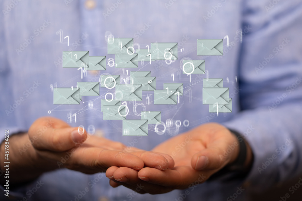 Hand holding using mobile phone with email icon on screen. Concept of business communication Hand holding using mobile phone with email icon on screen. Concept of business communication
