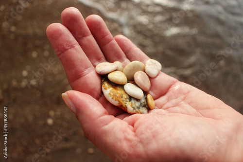 Pebbles in a woman's hand