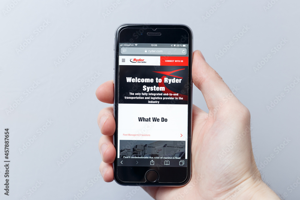 Ryder Hand Moscow / Russia - 04.21.2019: A hand holding a smartphone which ...