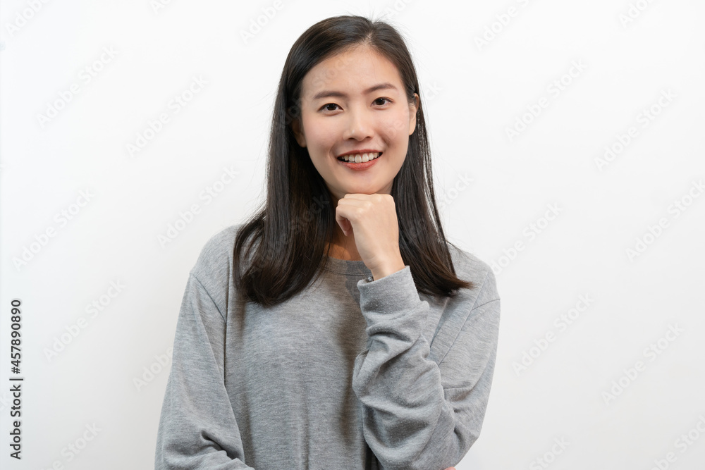 Asian young woman thoughtful thinking isolated on white back ground in studio. Asian young woman thoughtful thinking isolated on white back ground in studio.