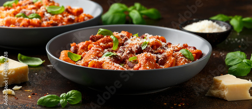 Traditional Italian Pasta e fagioli with bean, tomato and parmesan cheese