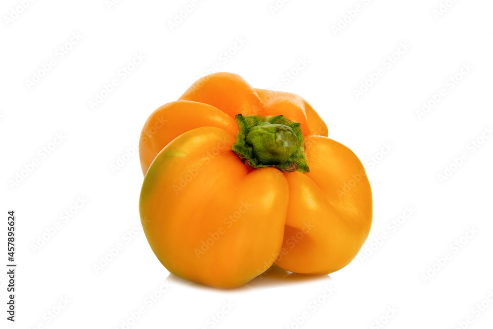 Yellow sweet peppers of an unusual shape. New harvest. Health and vitamins from nature. Close-up. Isolated on white background. Yellow sweet peppers of an unusual shape. New harvest. Health and vitamins from nature. Close-up. Isolated on white background.