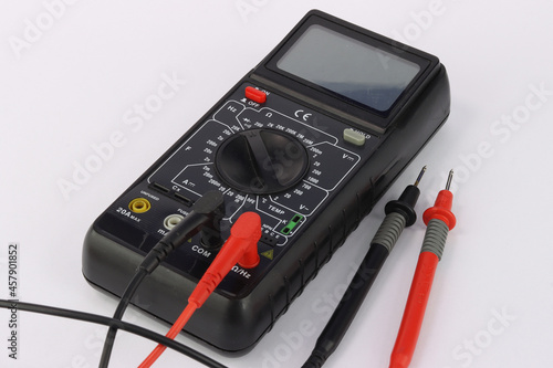 A multimeter for measuring parameters in an electrical panel and an electronic circuit.