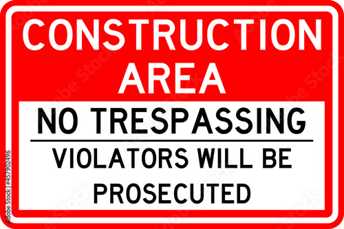 Construction area no trespassing violators will be prosecuted sign. White on red background. Safety signs and symbols.