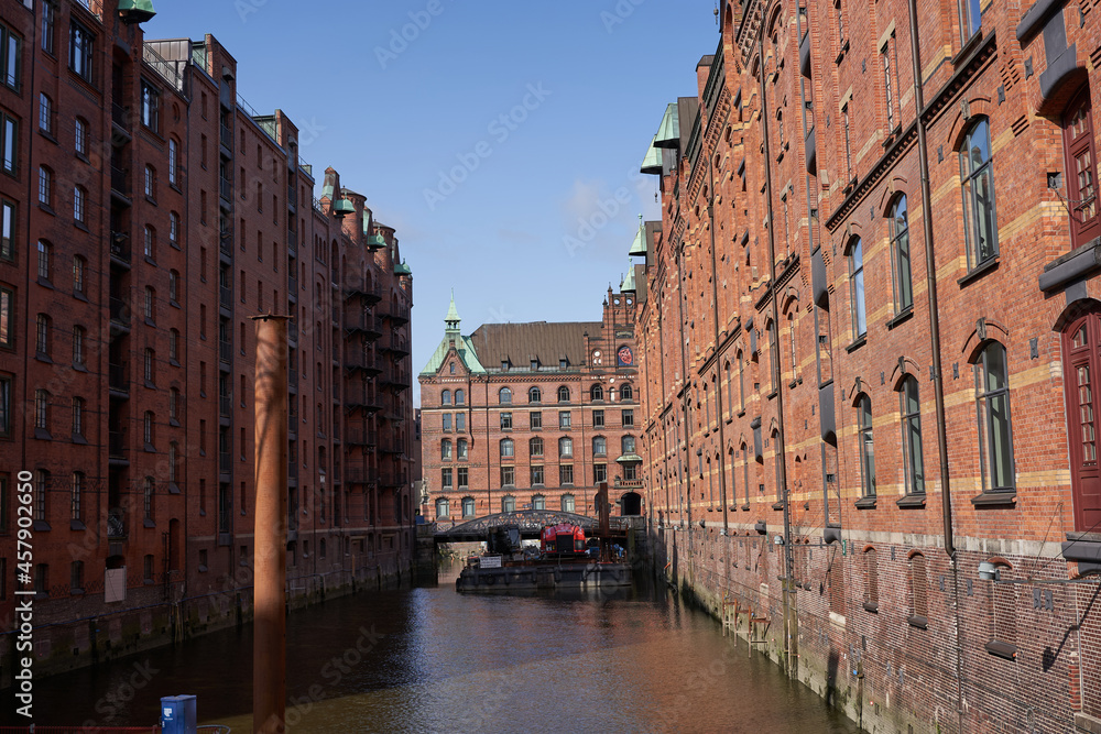 Hamburg, Germany - July 18, 2021 - The Speicherstadt - City of Warehouses - is the largest warehouse district in the world where the buildings stand on timber-pile foundations, oak log