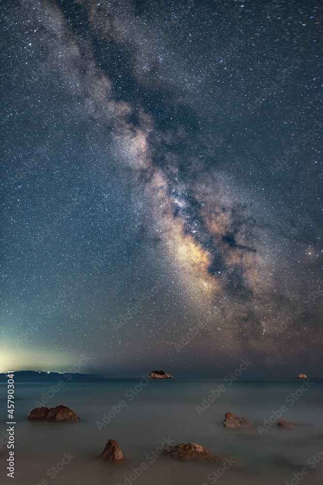 Milky way galaxy above Zakynthos island captured from Kefalonia island, Greece. The night sky is astronomical accurate. Milky way galaxy above Zakynthos island captured from Kefalonia island, Greece. The night sky is astronomical accurate.
