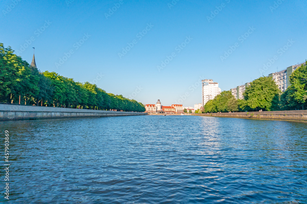 Fototapeta premium Fishing Village - ethnographic and trading-craft center in Kaliningrad. Quarter, built houses in the German style. Pregolya River, Russia, Europe.