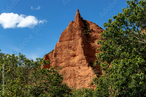 Bright red rock and chestnut trees at the Las Medulas World Heritage Site.