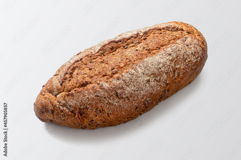 Loaf of bread made of wheat and rye flour, with a delicious appetizing crust Loaf of bread made of wheat and rye flour, with a delicious appetizing crust