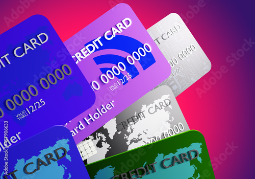 Credit cards set on pink ba...