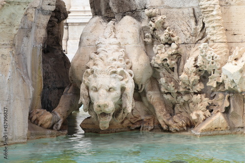 Four Rivers Fountain Detail with Sculpted Lion at Piazza Navona in Rome, Italy