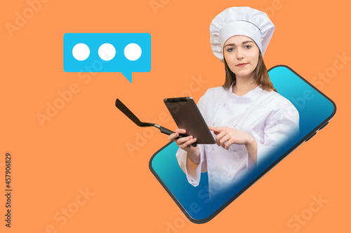 Chef girl with an electroni...