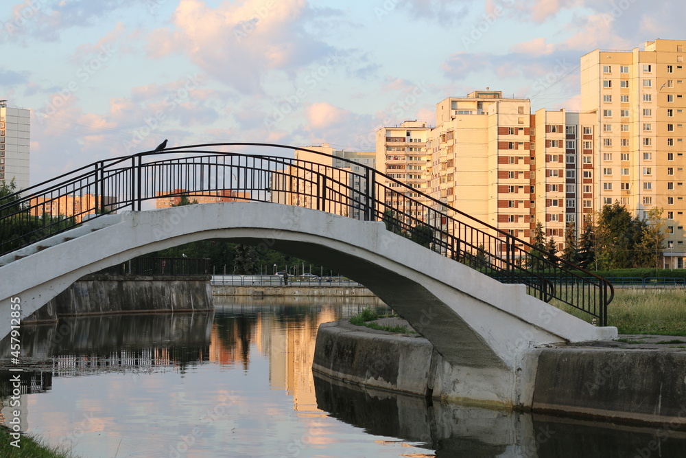Fototapeta premium City pond in Zelenograd administrative district in Moscow, Russia. Beautiful sunrise
