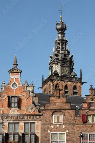 Facades of medieval houses and with the tower of the Stevenskerk in Nijmegen, Netherlands.