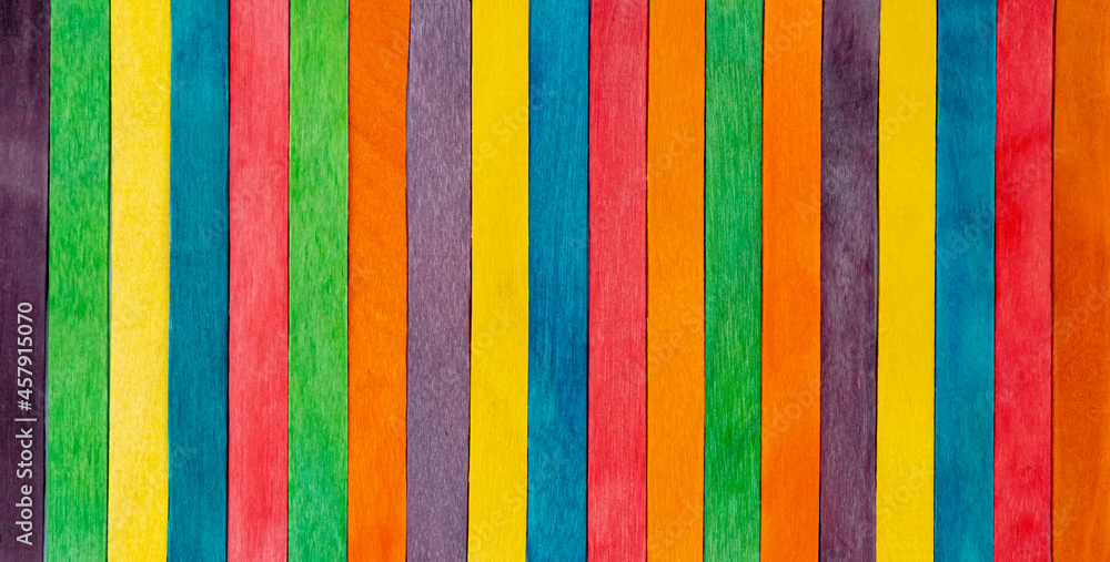 Wooden sticks, colorful background of ice cream sticks. Wooden sticks, colorful background of ice cream sticks.