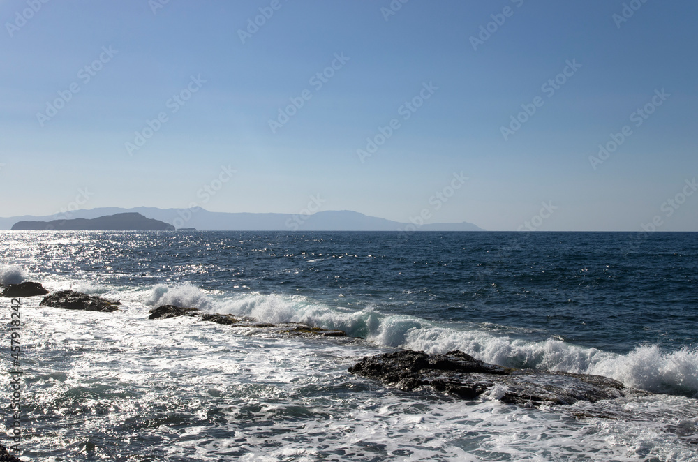 Fototapeta premium Landscape of the sea with the surf with a cloudless sky