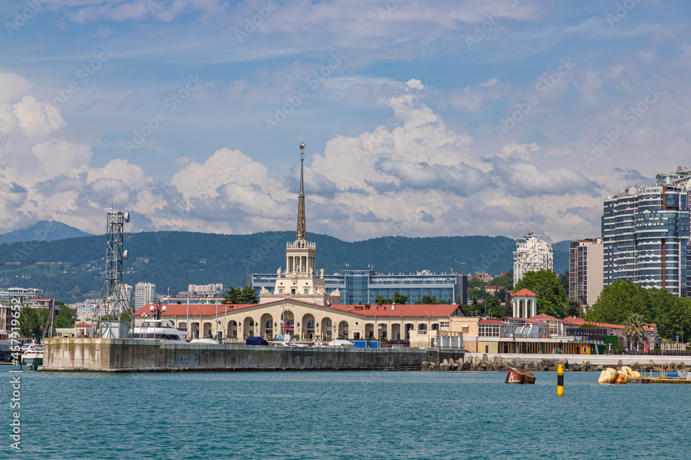 Fototapeta premium SOCHI, RUSSIA - JUNE 1, 2021: Sochi sea port in the afternoon. Sochi Marine station at Russian south resort.