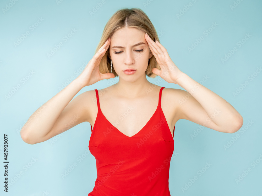 Overwhelmed stress. Nervous woman. Panic attack. Control emotion. Tired lady suffering headache holding hands temple isolated blue. Overwhelmed stress. Nervous woman. Panic attack. Control emotion. Tired lady suffering headache holding hands temple isolated blue.