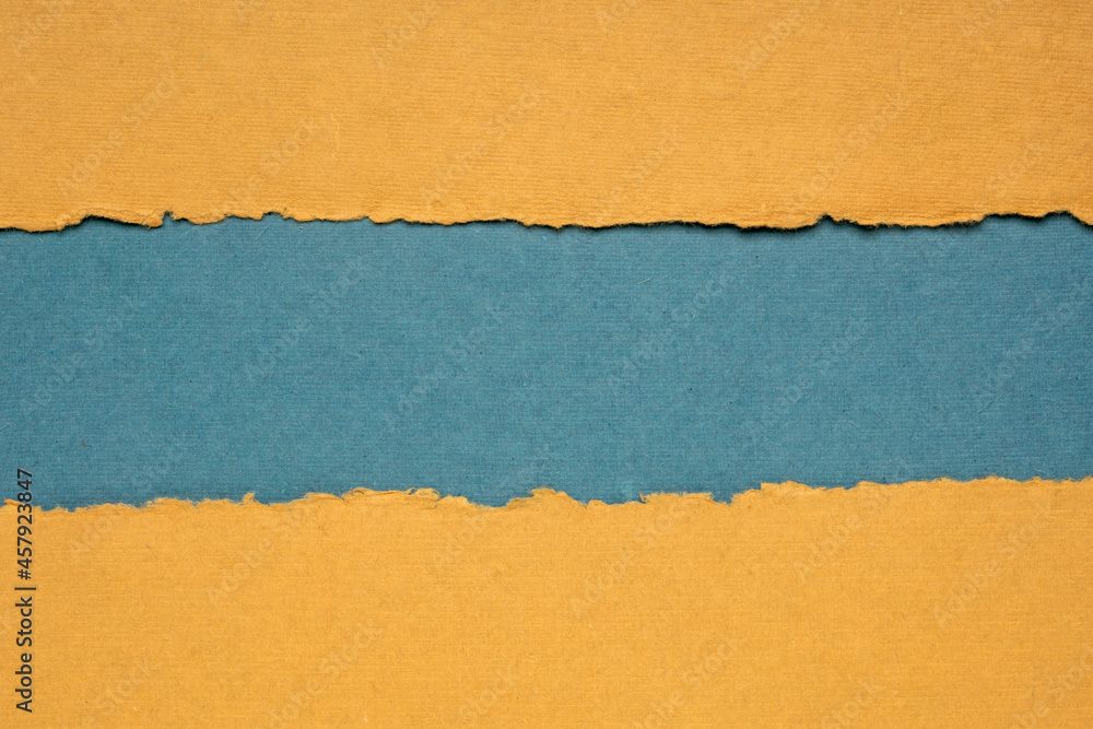 paper abstract in blue and orange with a copy space - sheets of handmade paper, blank web banner paper abstract in blue and orange with a copy space - sheets of handmade paper, blank web banner