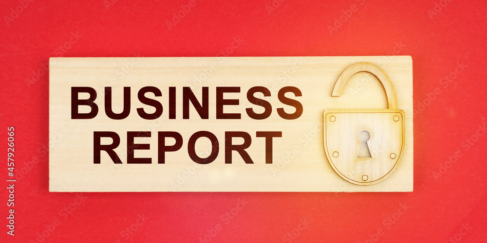 On a red background there is a small plaque on it with a lock and an inscription - BUSINESS REPORT