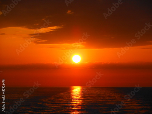 sunset over the sea © juliocesar