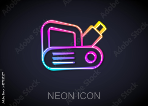 Glowing neon line Electric planer tool icon isolated on black background. Vector