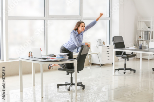 Young businesswoman having ...