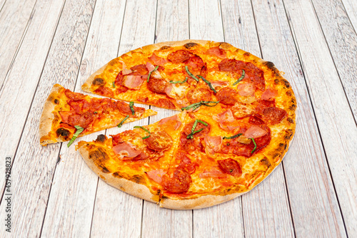 Meat Lovers Pizza with Pepperoni, Basil, Chorizo and Well Baked Ham