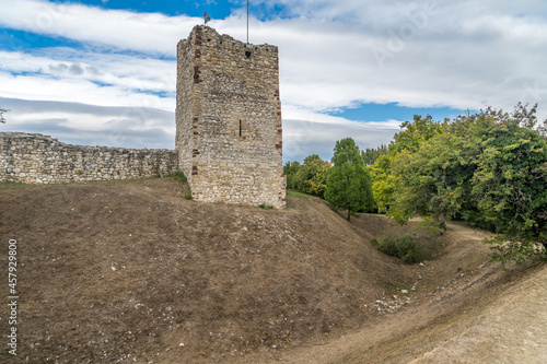 Restored medieval castle tower with moat at Essegvar Band in Veszprem county Hungary photo