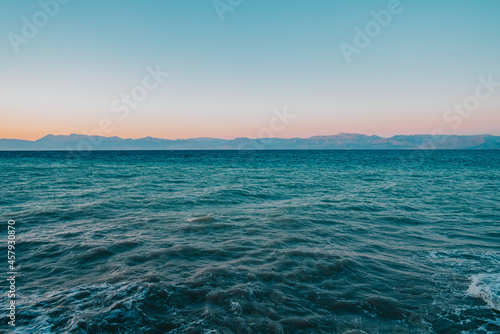 Mediterranean Ionic Sea view, seascape, clear turquoise water surface, ripple, little waves. Universal nature, resort, summer vacation nature background.