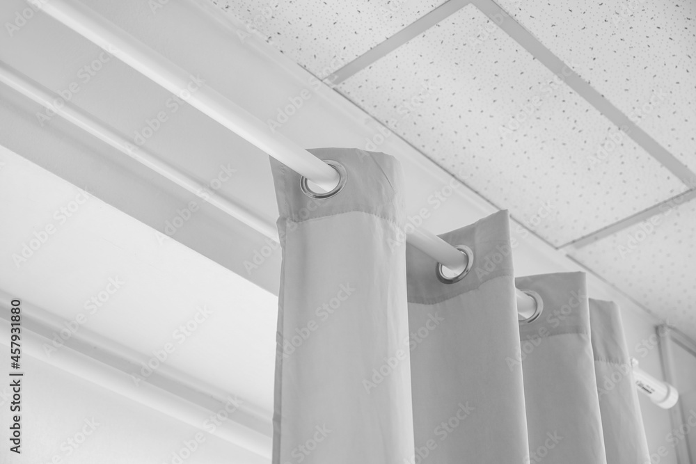 Grey curtains with rod, closeup Stock Photo | Adobe Stock