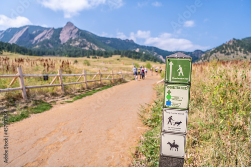 Close up of a sign at the entrance to the Chautauqua Park Hiking area in Boulder, Colorado. photo