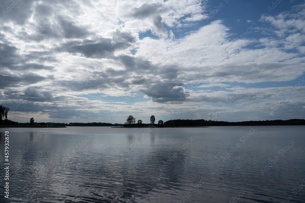 Fototapeta premium Clouds reflection on lake in summer