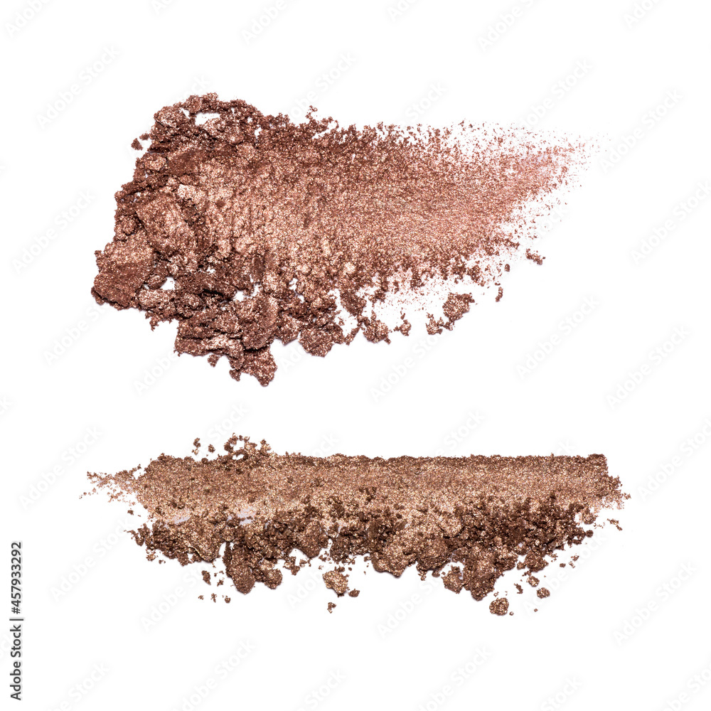A sample of bronze eye shadow. Cosmetic product isolated on white background. Closeup of a makeup product. A sample of bronze eye shadow. Cosmetic product isolated on white background. Closeup of a makeup product.