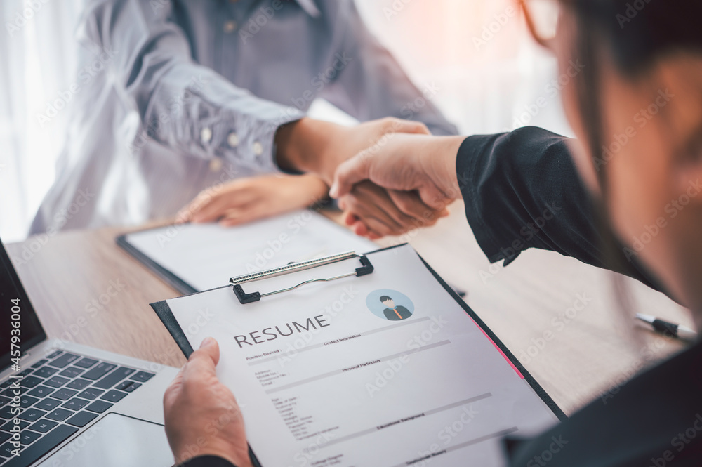 HR managers join hands with job applicants, accept proposals and agree to work together in the company.. HR managers join hands with job applicants, accept proposals and agree to work together in the company..