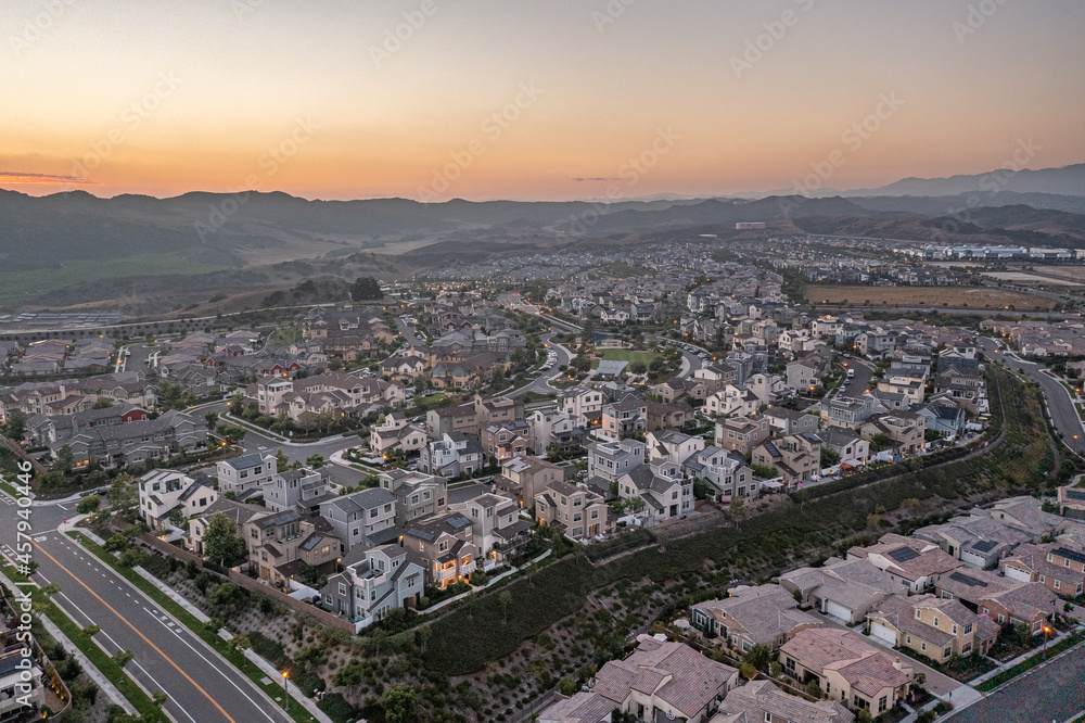 Sunset of an upscale Southern California neighborhood, master planned modern community