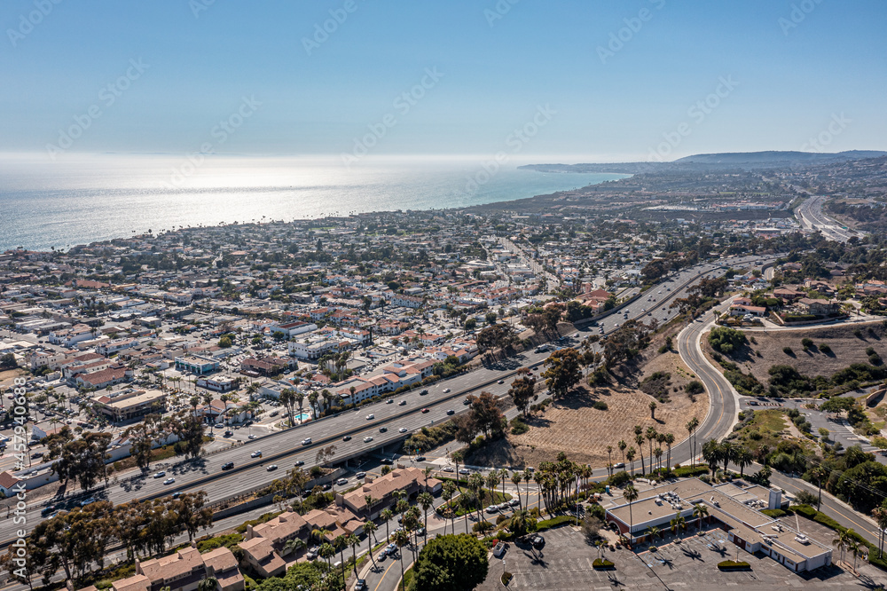 Aerial view of an ocean community and freeway
