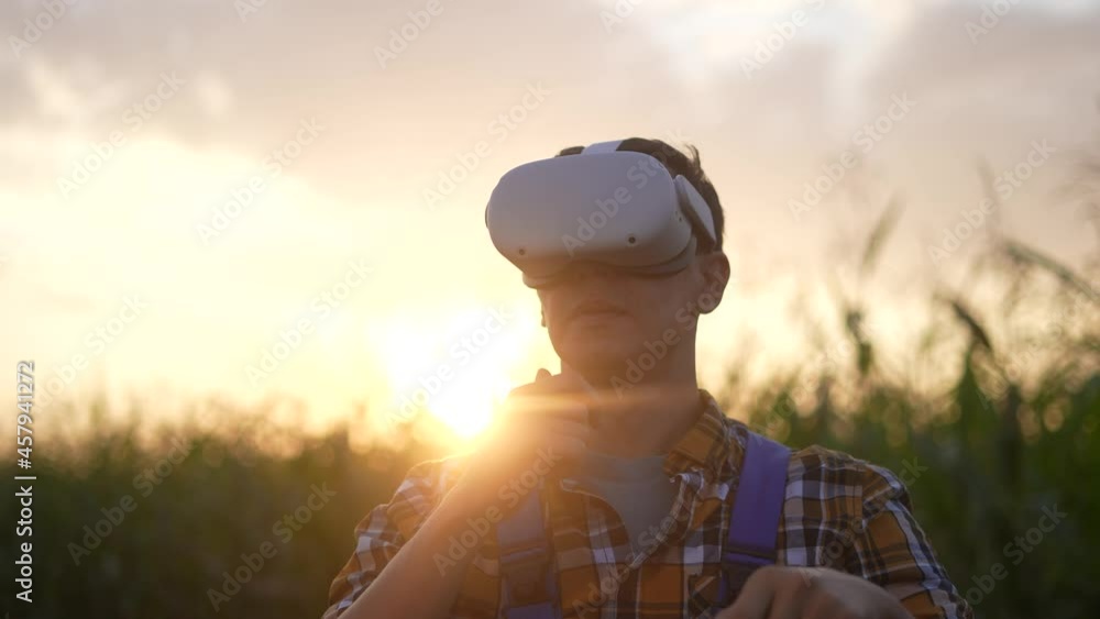 agriculture technology. smart agriculture a corn field business concept. farmer with virtual reality glasses. farmer working in corn field agriculture. virtual reality glasses study eco harvest agriculture technology. smart agriculture a corn field business concept. farmer with virtual reality glasses. farmer working in corn field agriculture. virtual reality glasses study eco harvest
