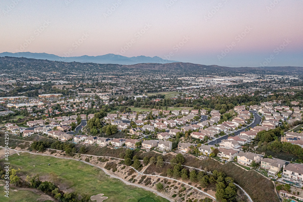 Aerial view of a gorgeous southern California sunset from an upscale neighborhood on a golf course. Aerial view of a gorgeous southern California sunset from an upscale neighborhood on a golf course.