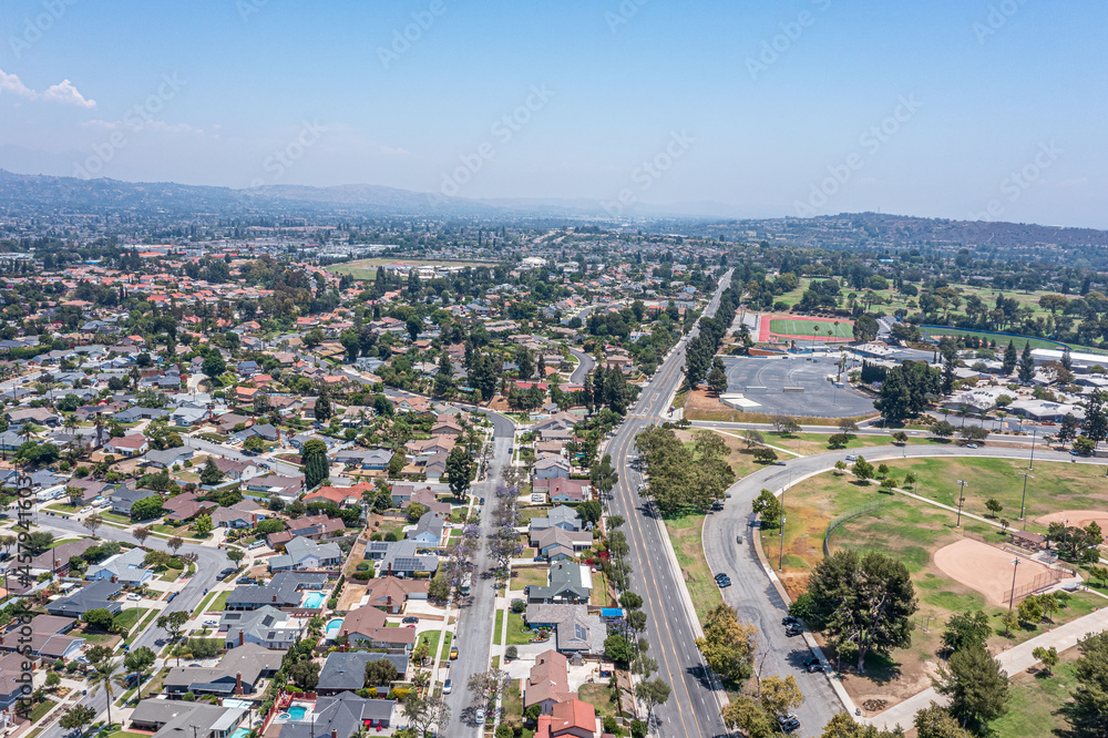 Fototapeta premium Aerial view of sports park in suburban California neighborhood.