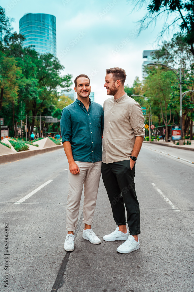 gay couple relaxing on the street